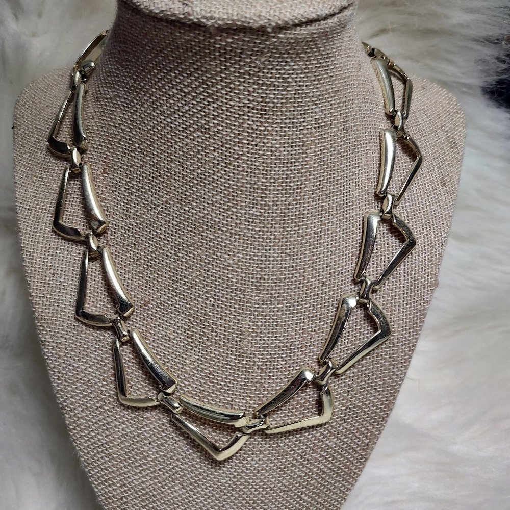 Gold colored necklace
